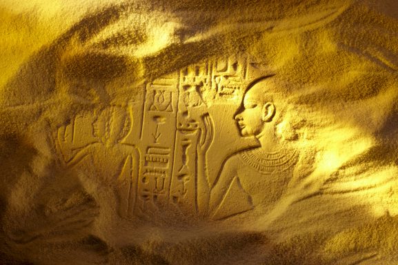 Hieroglyphic scene covered in sand