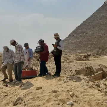 Man walks around he site of Cerro Quemado.