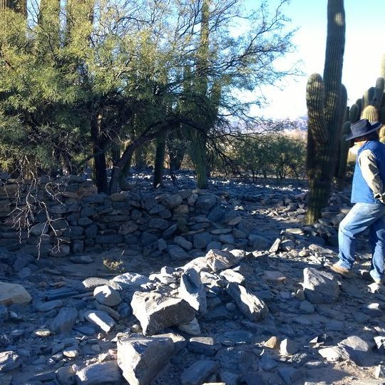 Man walks around he site of Cerro Quemado.