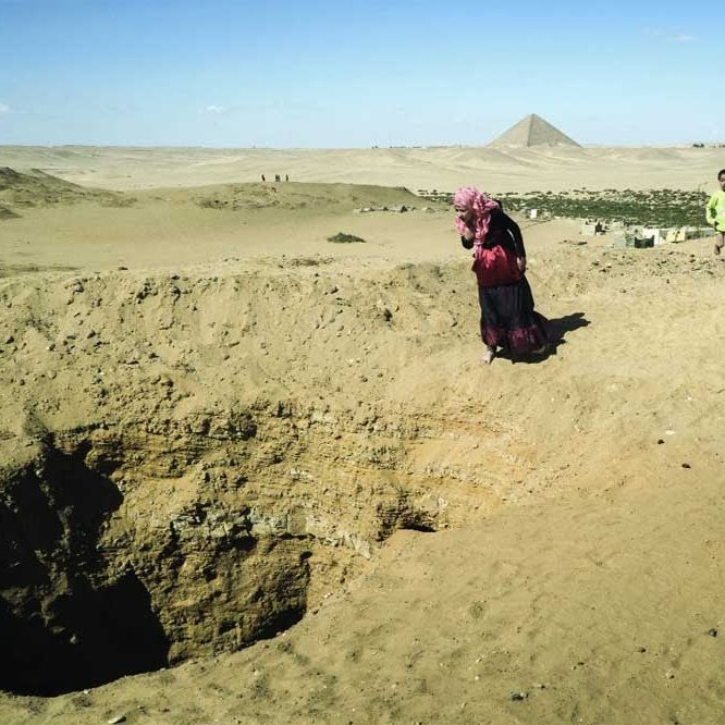 Man walks around he site of Cerro Quemado.