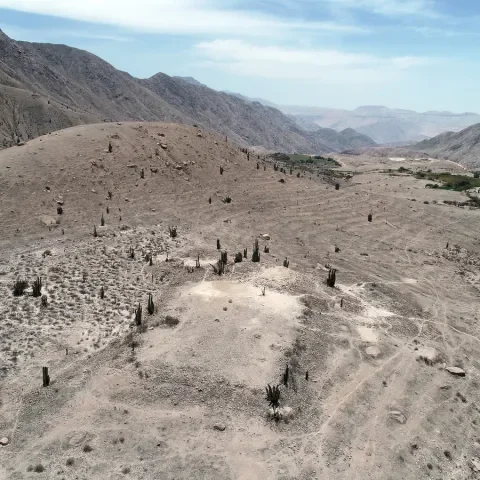 Man walks around he site of Cerro Quemado.