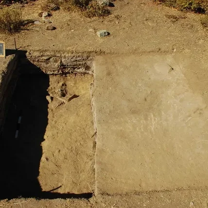 Man walks around he site of Cerro Quemado.